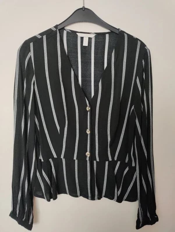 H&M gestreepte blouse met peplum, zwart/wit