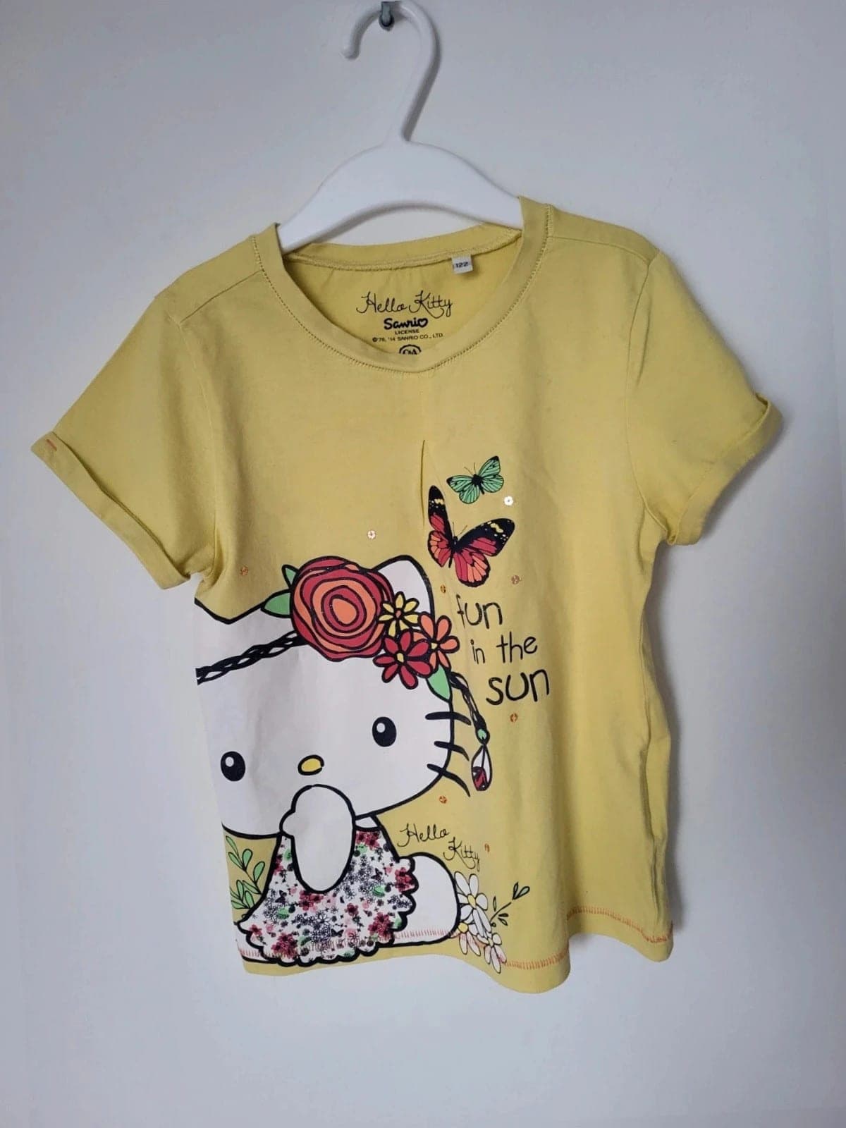 Hello kitty T-shirt C&A maat 122 geel meisjes