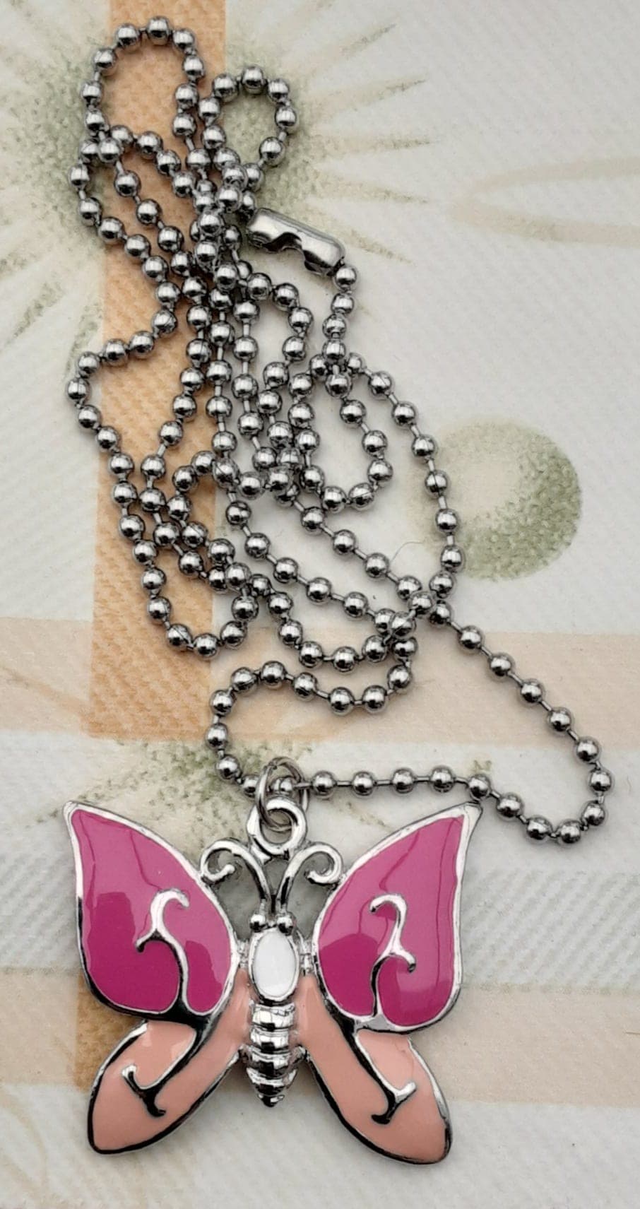 Vlinder hanger ketting - roze zilverkleurig