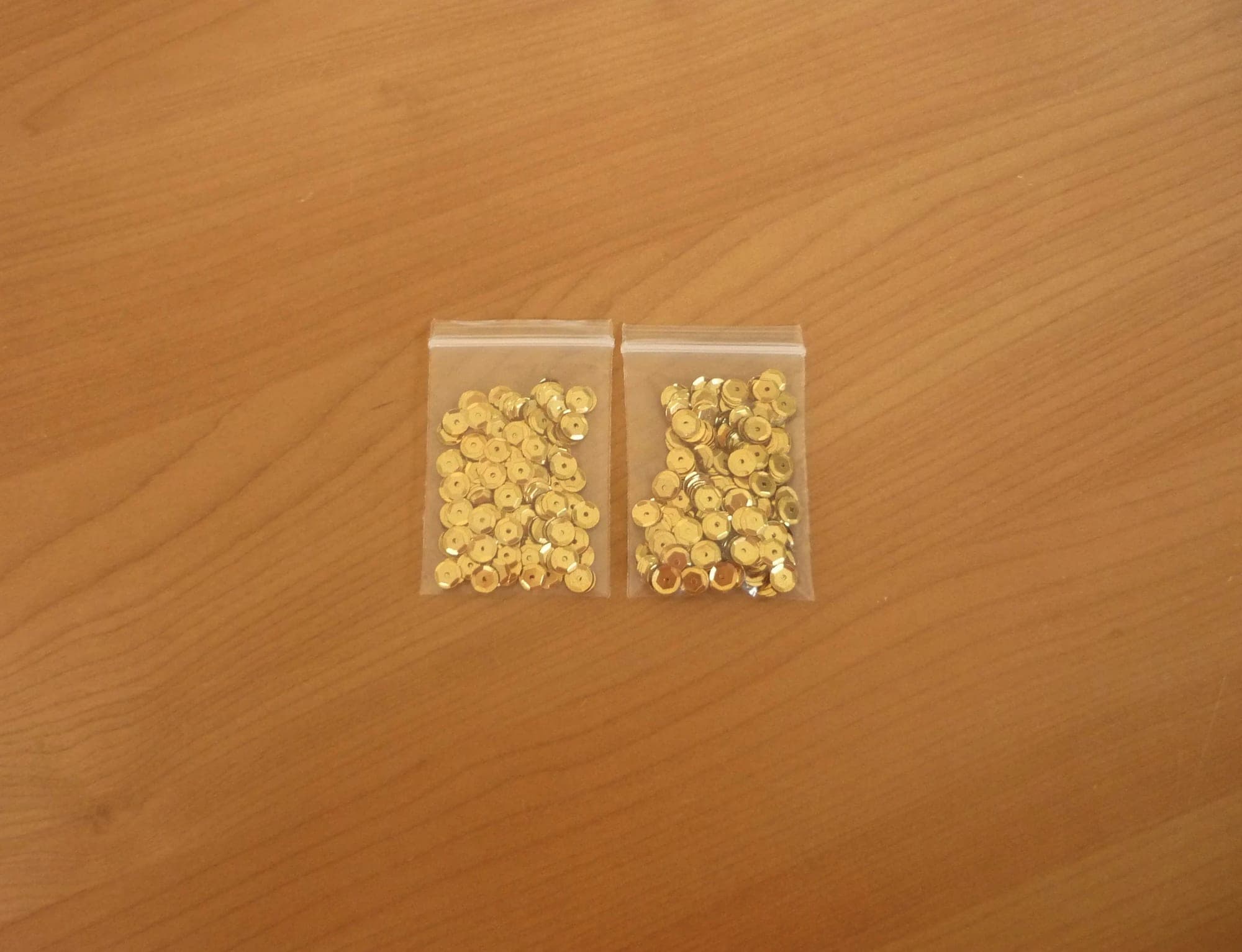 Lot goudkleurige zeshoekige pailletten 6 mm