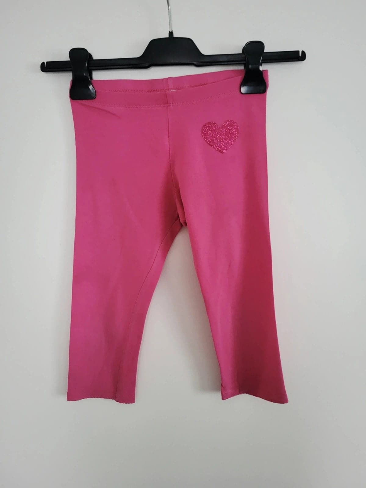H&M meisjes 7/8 legging roze met glitterhart – maat 122