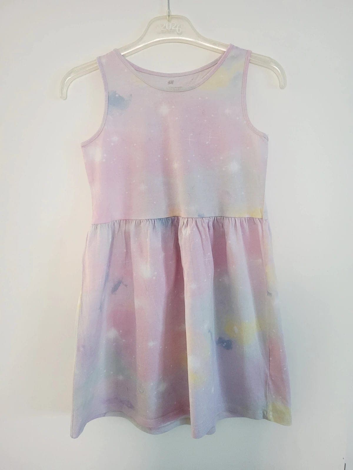 H&M jurk pastel galaxy / sterren maat 134/140