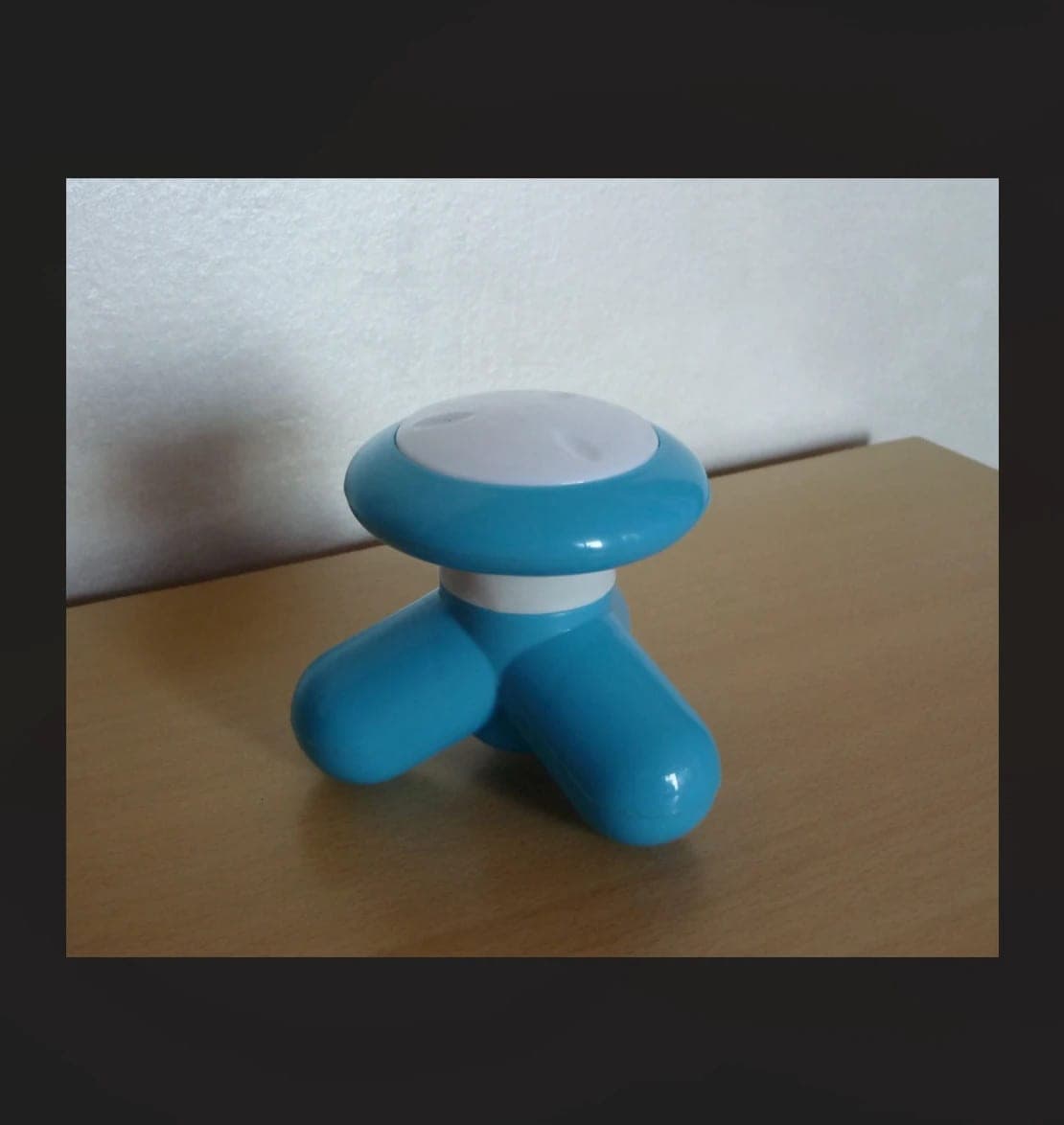 Blauw wit manueel massagetoestel