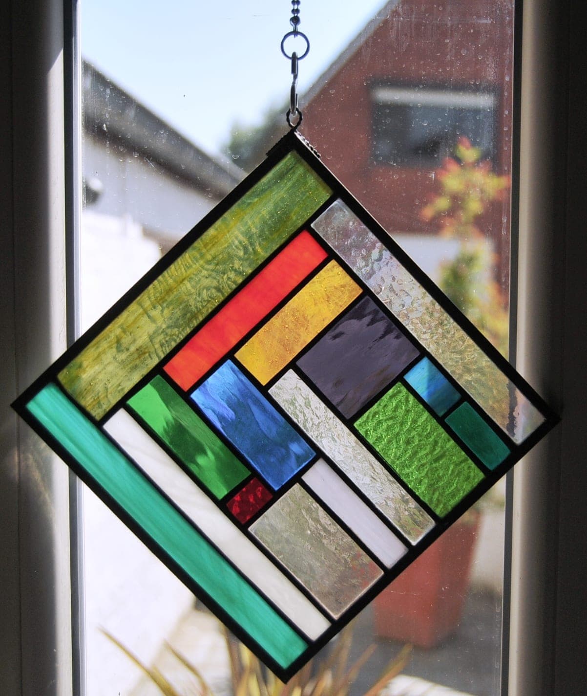 Glas in lood hanger voor raam