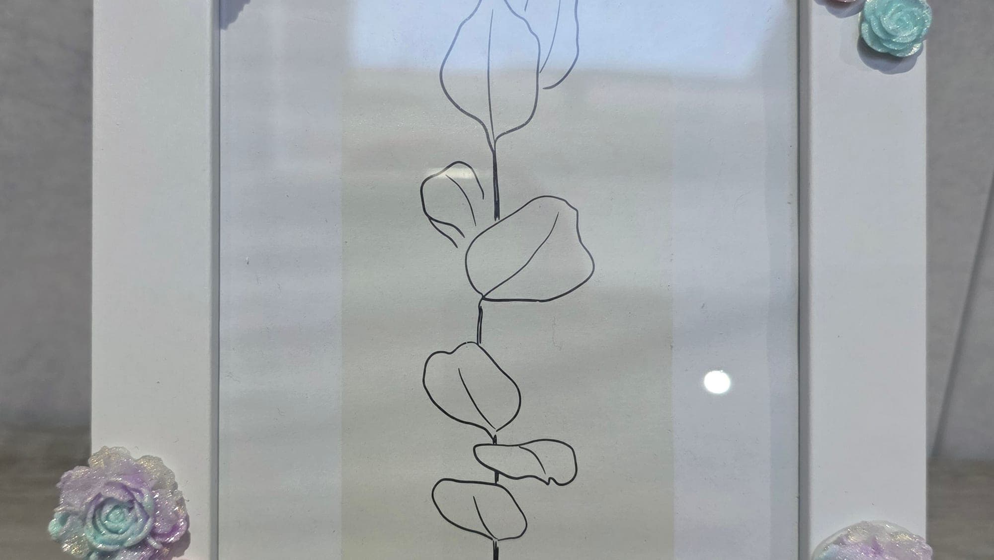 Decoratief fotolijstje met bloemen
