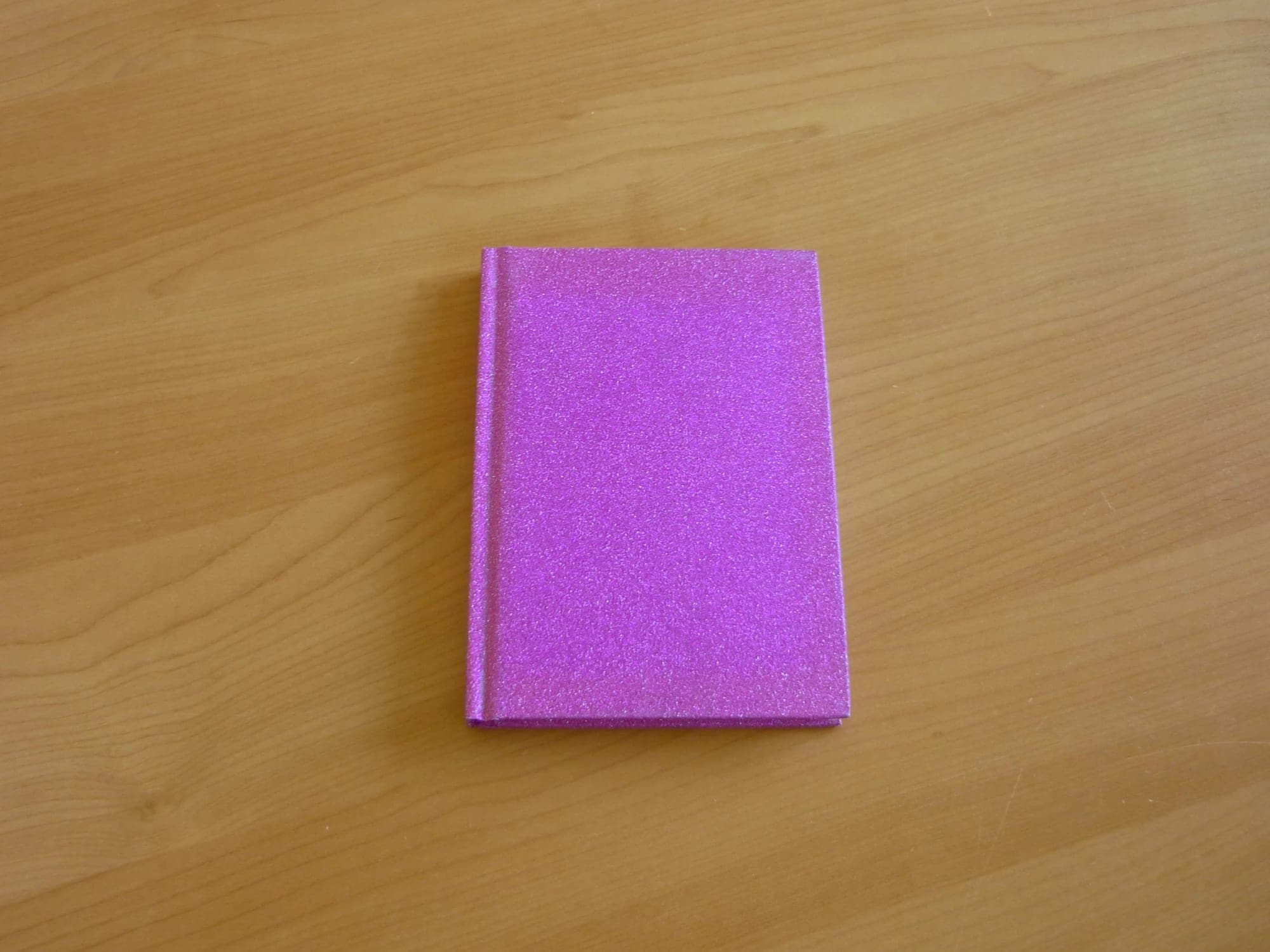 Paars fuchsia roze glitter gelinieerd notitieschrift notaboek
