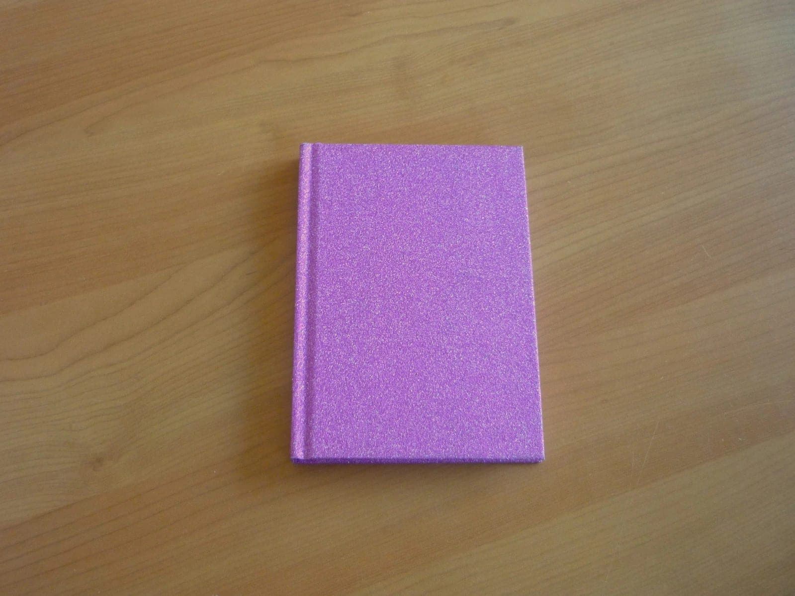 Paars roze glitter gelinieerd notitieschrift notaboek