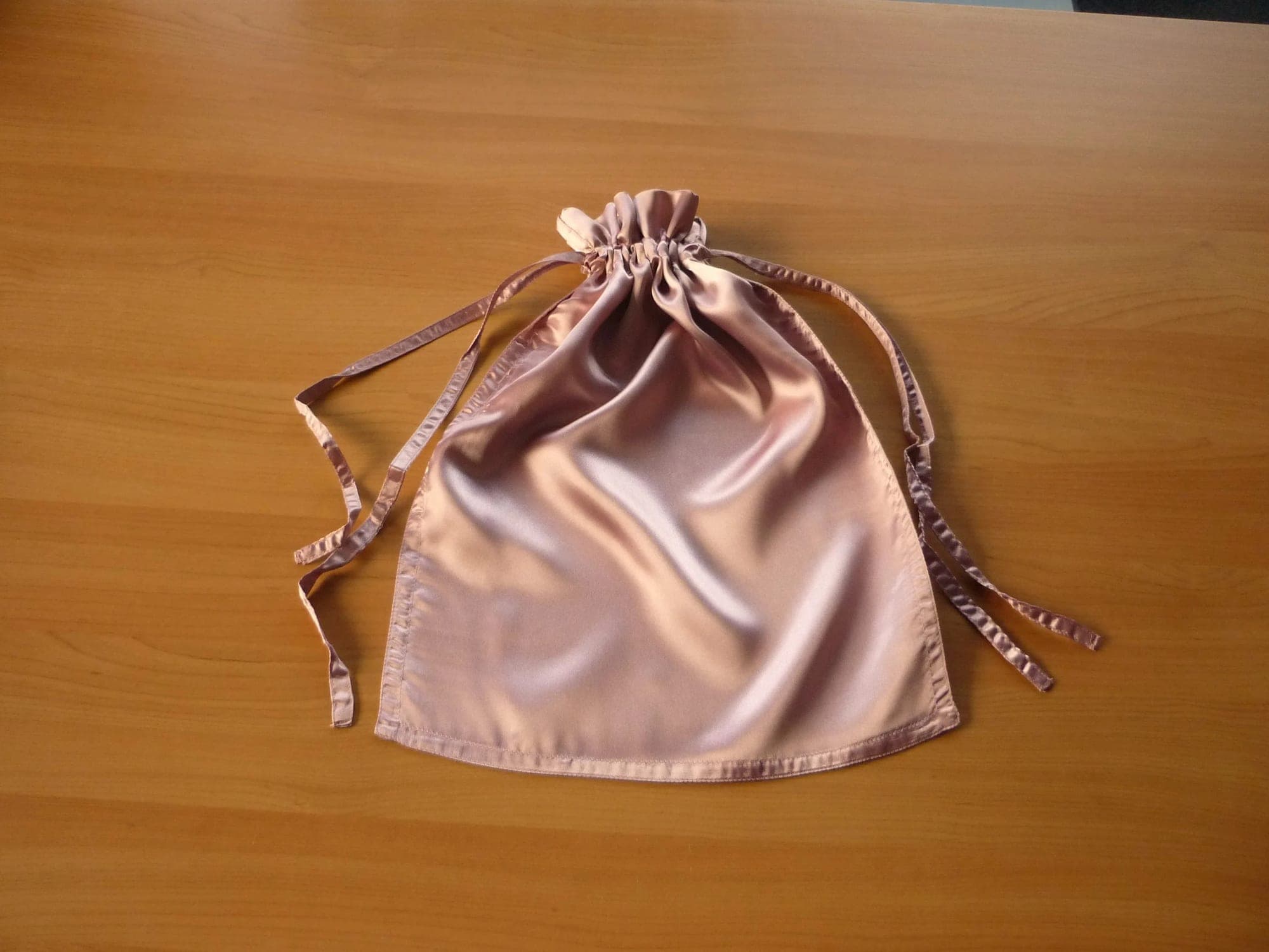 Pink satin travel bag storage organizer clothing bag