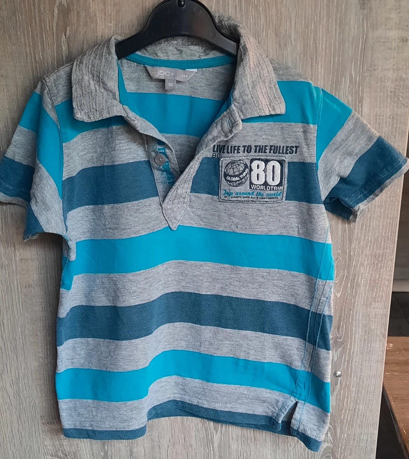 JBC gestreept poloshirt maat 116
