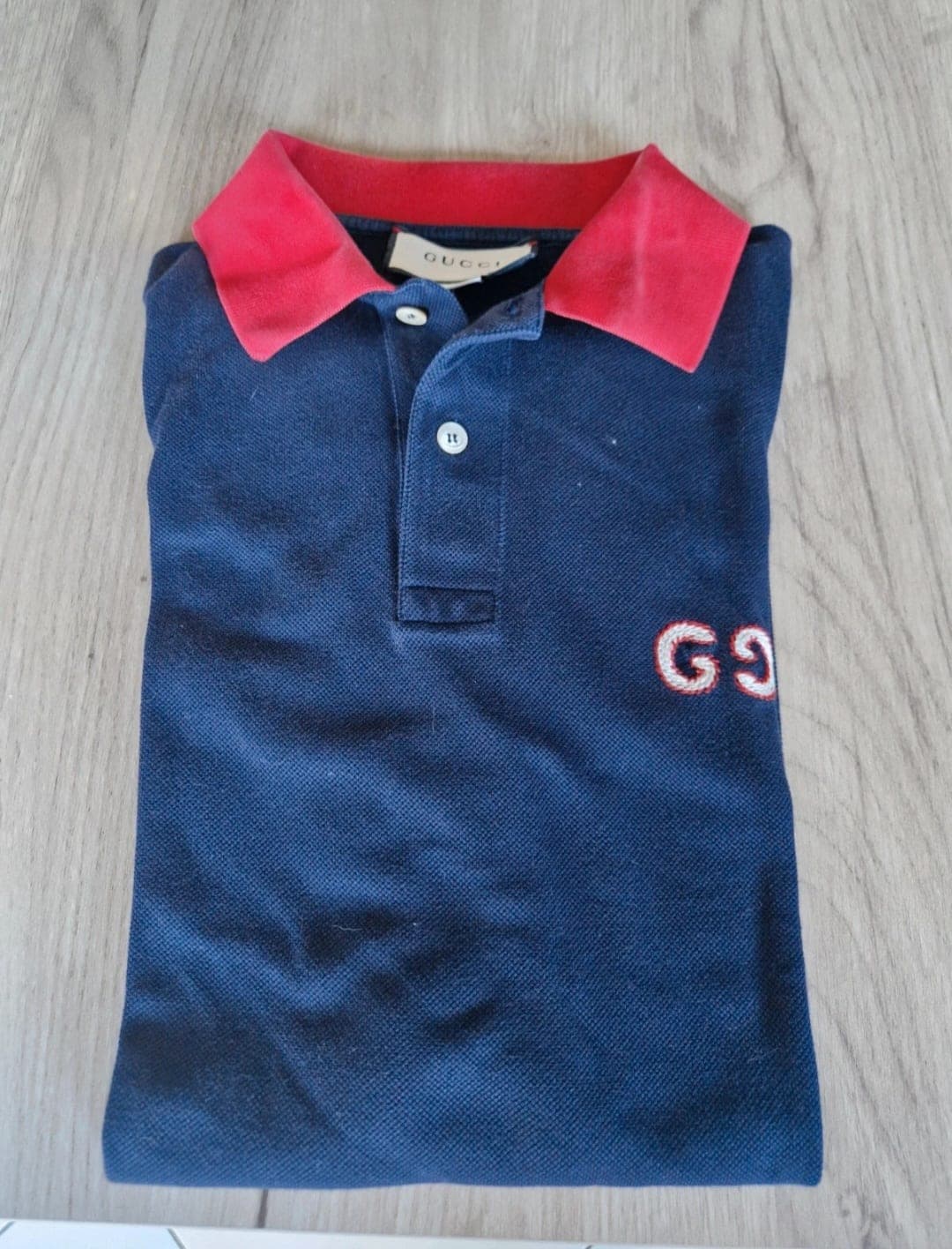 Gucci poloshirt met roze kraag en GG-logo