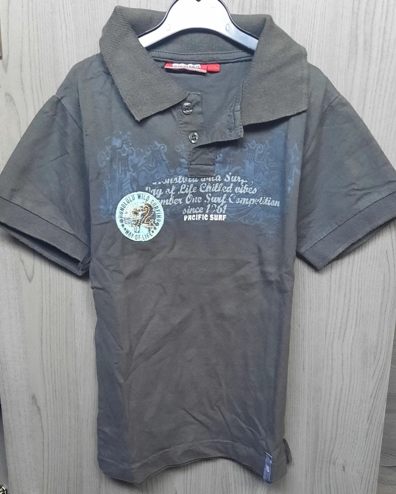 New Basic poloshirt, maat 116 cm (6 jaar)